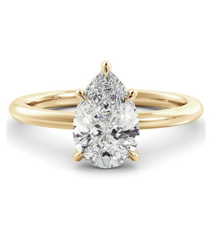 Solitaire Ring with 1.50 CT Pear Moissanite