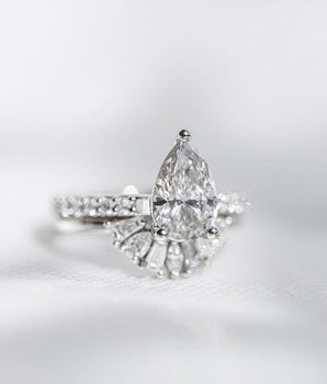 Pave Setting Ring with 1.50 CT Pear Moissanite