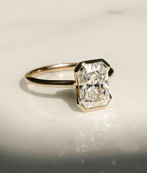 Half Bezel Ring with 1.50 CT Radiant Cut Moissanite