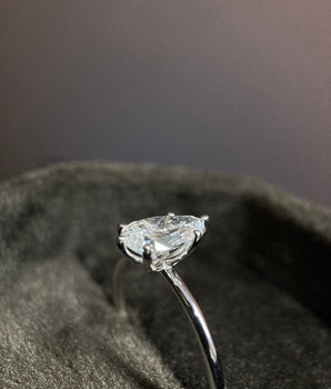 Solitaire Ring with 2.0 CT Pear Cut Moissanite