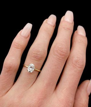 Solitaire Ring with 1.50 CT Oval Cut Moissanite